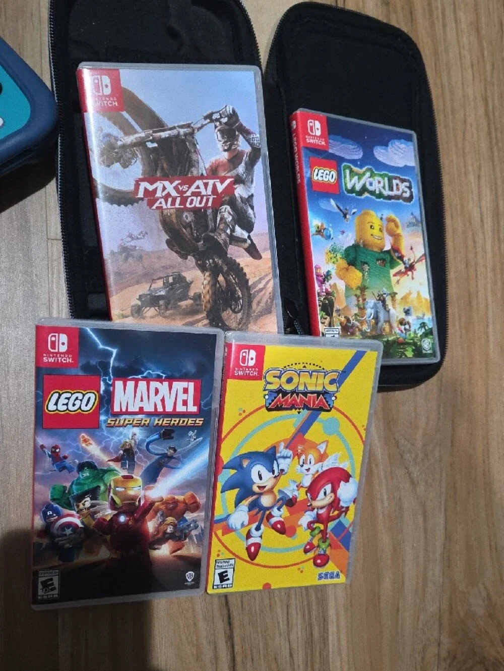 Nintendo Switch Lite Turquoise with Zelda Carry Case and Game Bundle